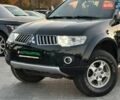 Черный Мицубиси Паджеро Спорт, объемом двигателя 2.48 л и пробегом 197 тыс. км за 12990 $, фото 1 на Automoto.ua