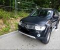 Чорний Міцубісі Паджеро Спорт, об'ємом двигуна 2.5 л та пробігом 212 тис. км за 13308 $, фото 1 на Automoto.ua