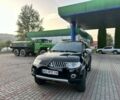 Чорний Міцубісі Паджеро Спорт, об'ємом двигуна 2.5 л та пробігом 270 тис. км за 12300 $, фото 1 на Automoto.ua