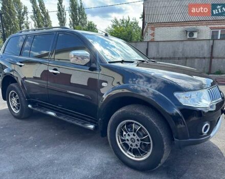 Чорний Міцубісі Паджеро Спорт, об'ємом двигуна 2.48 л та пробігом 199 тис. км за 14200 $, фото 6 на Automoto.ua