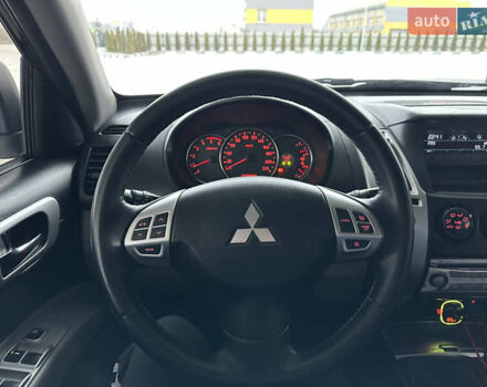 Черный Мицубиси Паджеро Спорт, объемом двигателя 2.5 л и пробегом 295 тыс. км за 13200 $, фото 39 на Automoto.ua