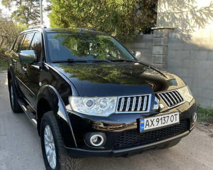 Черный Мицубиси Паджеро Спорт, объемом двигателя 2.5 л и пробегом 169 тыс. км за 15200 $, фото 2 на Automoto.ua