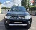 Чорний Міцубісі Паджеро Спорт, об'ємом двигуна 2.48 л та пробігом 199 тис. км за 14200 $, фото 1 на Automoto.ua