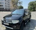 Чорний Міцубісі Паджеро Спорт, об'ємом двигуна 2.48 л та пробігом 164 тис. км за 15800 $, фото 1 на Automoto.ua