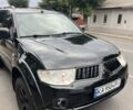 Черный Мицубиси Паджеро Спорт, объемом двигателя 2.5 л и пробегом 200 тыс. км за 6000 $, фото 1 на Automoto.ua
