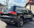 Чорний Міцубісі Паджеро Спорт, об'ємом двигуна 2.48 л та пробігом 199 тис. км за 14200 $, фото 13 на Automoto.ua