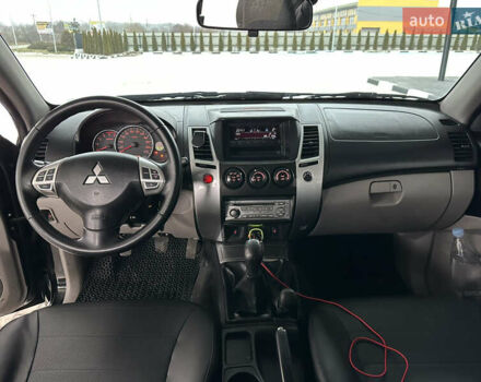 Черный Мицубиси Паджеро Спорт, объемом двигателя 2.5 л и пробегом 295 тыс. км за 13200 $, фото 36 на Automoto.ua