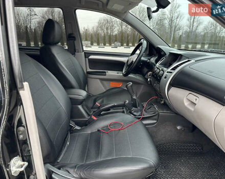 Черный Мицубиси Паджеро Спорт, объемом двигателя 2.5 л и пробегом 295 тыс. км за 13200 $, фото 45 на Automoto.ua