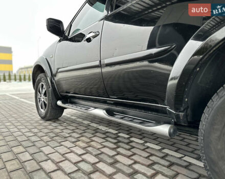 Черный Мицубиси Паджеро Спорт, объемом двигателя 2.5 л и пробегом 295 тыс. км за 13200 $, фото 27 на Automoto.ua