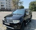 Чорний Міцубісі Паджеро Спорт, об'ємом двигуна 2.48 л та пробігом 164 тис. км за 15800 $, фото 1 на Automoto.ua