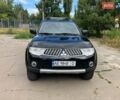 Чорний Міцубісі Паджеро Спорт, об'ємом двигуна 2.48 л та пробігом 261 тис. км за 15000 $, фото 1 на Automoto.ua