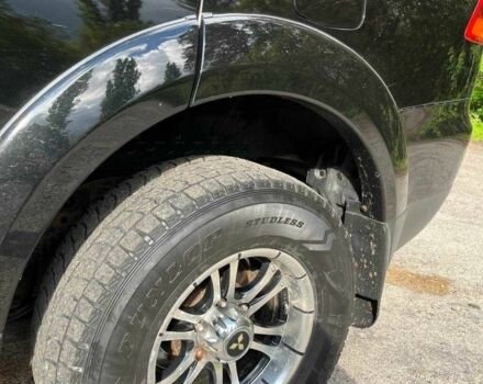 Чорний Міцубісі Паджеро Спорт, об'ємом двигуна 2.5 л та пробігом 150 тис. км за 16700 $, фото 11 на Automoto.ua