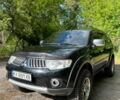 Чорний Міцубісі Паджеро Спорт, об'ємом двигуна 2.5 л та пробігом 150 тис. км за 16700 $, фото 1 на Automoto.ua