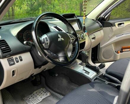 Чорний Міцубісі Паджеро Спорт, об'ємом двигуна 2.5 л та пробігом 150 тис. км за 16700 $, фото 14 на Automoto.ua