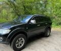 Чорний Міцубісі Паджеро Спорт, об'ємом двигуна 2.5 л та пробігом 150 тис. км за 16700 $, фото 3 на Automoto.ua
