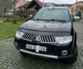 Чорний Міцубісі Паджеро Спорт, об'ємом двигуна 2.48 л та пробігом 300 тис. км за 15500 $, фото 14 на Automoto.ua