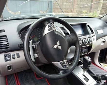 Чорний Міцубісі Паджеро Спорт, об'ємом двигуна 2.48 л та пробігом 300 тис. км за 15500 $, фото 8 на Automoto.ua