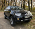 Черный Мицубиси Паджеро Спорт, объемом двигателя 2.5 л и пробегом 230 тыс. км за 14800 $, фото 2 на Automoto.ua