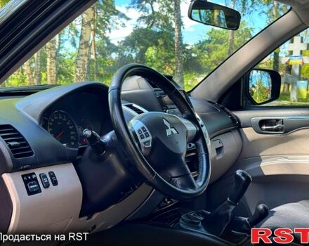 Чорний Міцубісі Паджеро Спорт, об'ємом двигуна 2.5 л та пробігом 181 тис. км за 13300 $, фото 5 на Automoto.ua