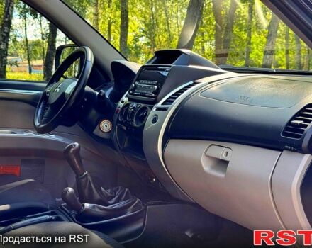 Чорний Міцубісі Паджеро Спорт, об'ємом двигуна 2.5 л та пробігом 181 тис. км за 13300 $, фото 9 на Automoto.ua