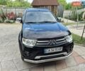Чорний Міцубісі Паджеро Спорт, об'ємом двигуна 2.48 л та пробігом 192 тис. км за 16300 $, фото 1 на Automoto.ua