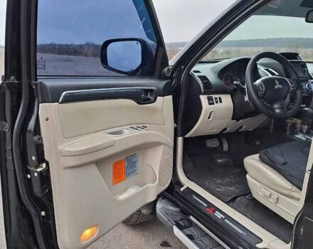 Черный Мицубиси Паджеро Спорт, объемом двигателя 2.5 л и пробегом 170 тыс. км за 15200 $, фото 20 на Automoto.ua