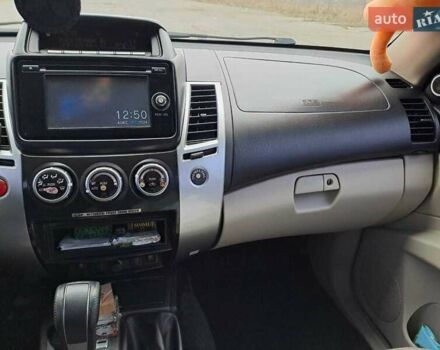 Черный Мицубиси Паджеро Спорт, объемом двигателя 2.5 л и пробегом 170 тыс. км за 15200 $, фото 23 на Automoto.ua