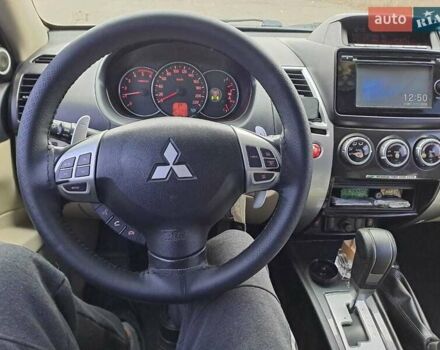 Черный Мицубиси Паджеро Спорт, объемом двигателя 2.5 л и пробегом 170 тыс. км за 15200 $, фото 15 на Automoto.ua