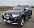 Черный Мицубиси Паджеро Спорт, объемом двигателя 2.5 л и пробегом 170 тыс. км за 15200 $, фото 1 на Automoto.ua