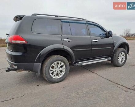 Черный Мицубиси Паджеро Спорт, объемом двигателя 2.5 л и пробегом 170 тыс. км за 15200 $, фото 18 на Automoto.ua
