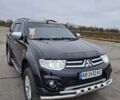 Черный Мицубиси Паджеро Спорт, объемом двигателя 2.5 л и пробегом 170 тыс. км за 15200 $, фото 2 на Automoto.ua