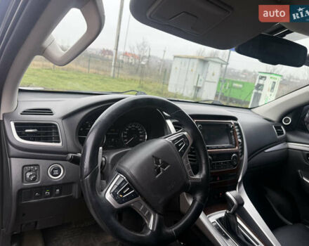 Черный Мицубиси Паджеро Спорт, объемом двигателя 2.44 л и пробегом 135 тыс. км за 22500 $, фото 1 на Automoto.ua