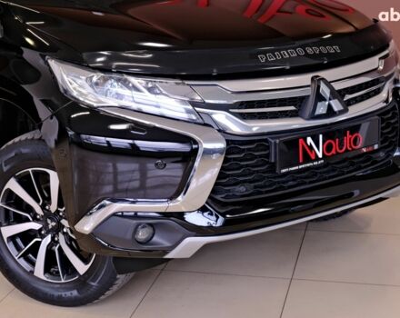 Черный Мицубиси Паджеро Спорт, объемом двигателя 2.4 л и пробегом 182 тыс. км за 19900 $, фото 2 на Automoto.ua