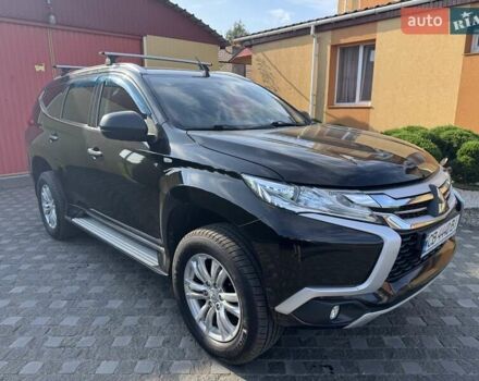 Черный Мицубиси Паджеро Спорт, объемом двигателя 2.44 л и пробегом 181 тыс. км за 18500 $, фото 2 на Automoto.ua