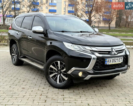 Черный Мицубиси Паджеро Спорт, объемом двигателя 2.44 л и пробегом 119 тыс. км за 19999 $, фото 1 на Automoto.ua