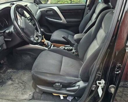 Чорний Міцубісі Паджеро Спорт, об'ємом двигуна 2.44 л та пробігом 96 тис. км за 21000 $, фото 12 на Automoto.ua