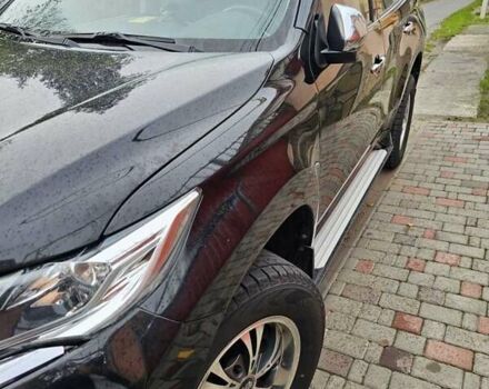 Чорний Міцубісі Паджеро Спорт, об'ємом двигуна 2.44 л та пробігом 96 тис. км за 21000 $, фото 1 на Automoto.ua