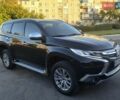Черный Мицубиси Паджеро Спорт, объемом двигателя 2.44 л и пробегом 95 тыс. км за 19850 $, фото 1 на Automoto.ua