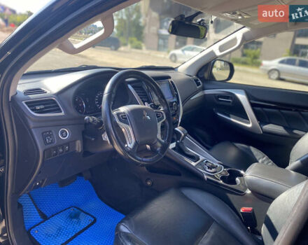 Черный Мицубиси Паджеро Спорт, объемом двигателя 2.44 л и пробегом 144 тыс. км за 28000 $, фото 4 на Automoto.ua