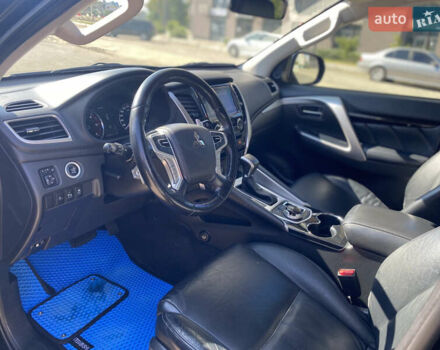 Черный Мицубиси Паджеро Спорт, объемом двигателя 2.44 л и пробегом 144 тыс. км за 28000 $, фото 5 на Automoto.ua