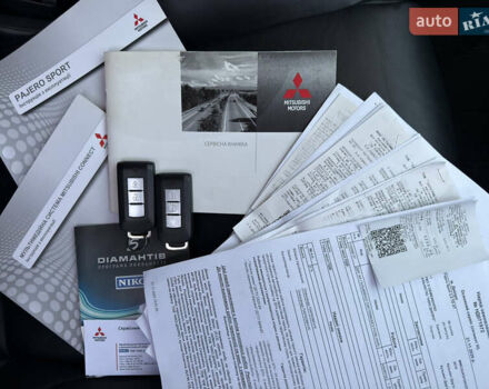 Чорний Міцубісі Паджеро Спорт, об'ємом двигуна 2.44 л та пробігом 96 тис. км за 28799 $, фото 6 на Automoto.ua