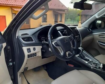 Чорний Міцубісі Паджеро Спорт, об'ємом двигуна 2.44 л та пробігом 140 тис. км за 30500 $, фото 1 на Automoto.ua