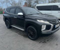 Чорний Міцубісі Паджеро Спорт, об'ємом двигуна 2.44 л та пробігом 48 тис. км за 40000 $, фото 1 на Automoto.ua