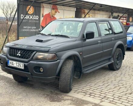 Чорний Міцубісі Паджеро Спорт, об'ємом двигуна 2.5 л та пробігом 300 тис. км за 6500 $, фото 1 на Automoto.ua