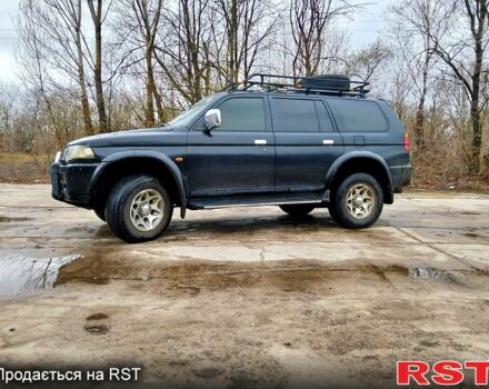 Черный Мицубиси Паджеро Спорт, объемом двигателя 3 л и пробегом 330 тыс. км за 8000 $, фото 1 на Automoto.ua
