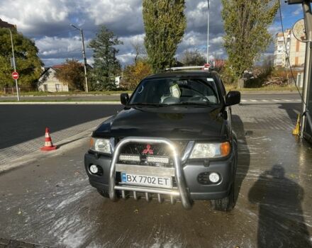 Черный Мицубиси Паджеро Спорт, объемом двигателя 3 л и пробегом 400 тыс. км за 6500 $, фото 1 на Automoto.ua