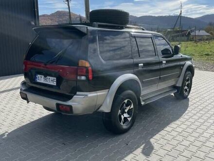 Черный Мицубиси Паджеро Спорт, объемом двигателя 3 л и пробегом 319 тыс. км за 5500 $, фото 1 на Automoto.ua