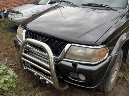 Черный Мицубиси Паджеро Спорт, объемом двигателя 3 л и пробегом 216 тыс. км за 7000 $, фото 1 на Automoto.ua