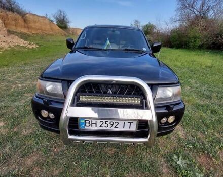 Чорний Міцубісі Паджеро Спорт, об'ємом двигуна 3 л та пробігом 167 тис. км за 6000 $, фото 1 на Automoto.ua