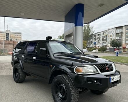 Мицубиси Паджеро Спорт 2002 в Славянске на Automoto.ua Черный Мицубиси Паджеро Спорт, объемом двигателя 2.5 л и пробегом 333 тыс. км за 3450 $, фото 1 на Automoto.ua